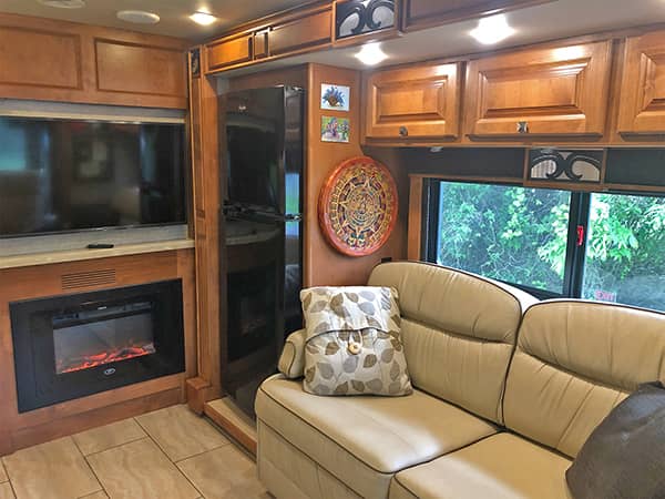 Sofa, Residential Fridge and Fireplace