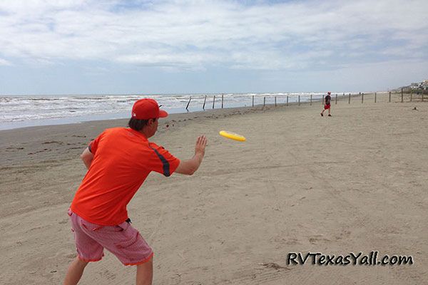 Playing Frisbee on the Beach